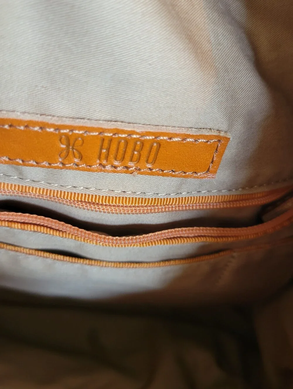 Hobo Classic Brown Leather Tote Bag With Roomy Interior.
